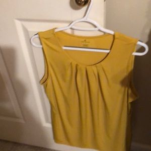 Mustard color sleeveless top. Knit fabric in excellent condition.